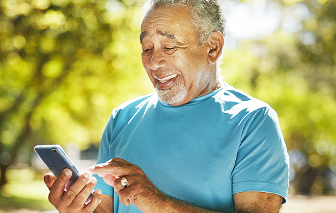 senior man with phone